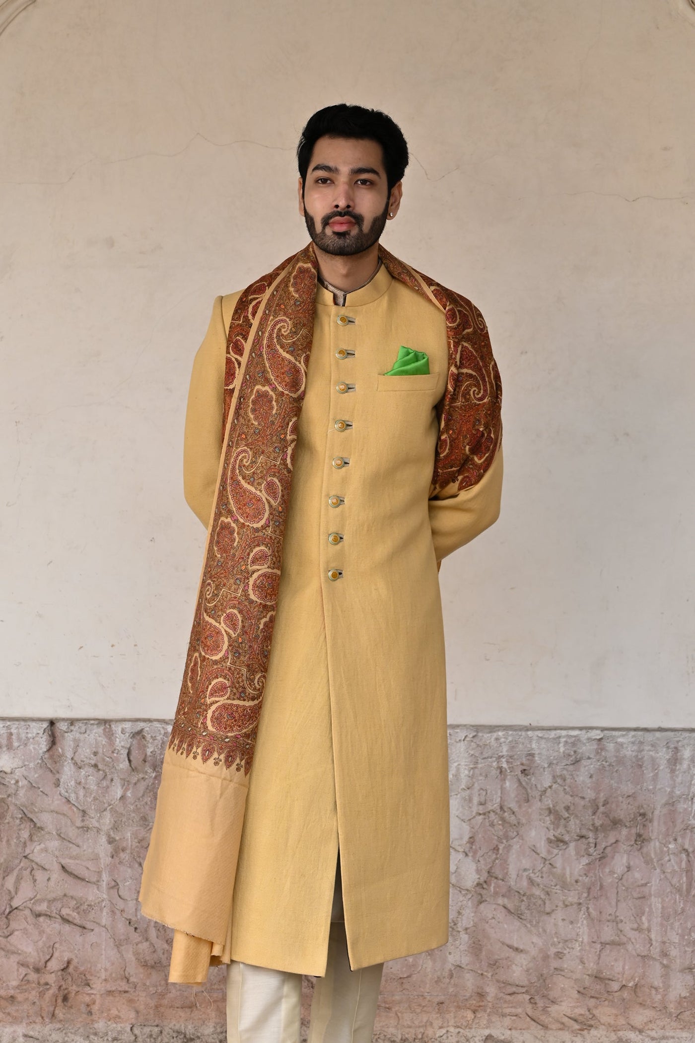 Fashionable pale yellow groom sherwani