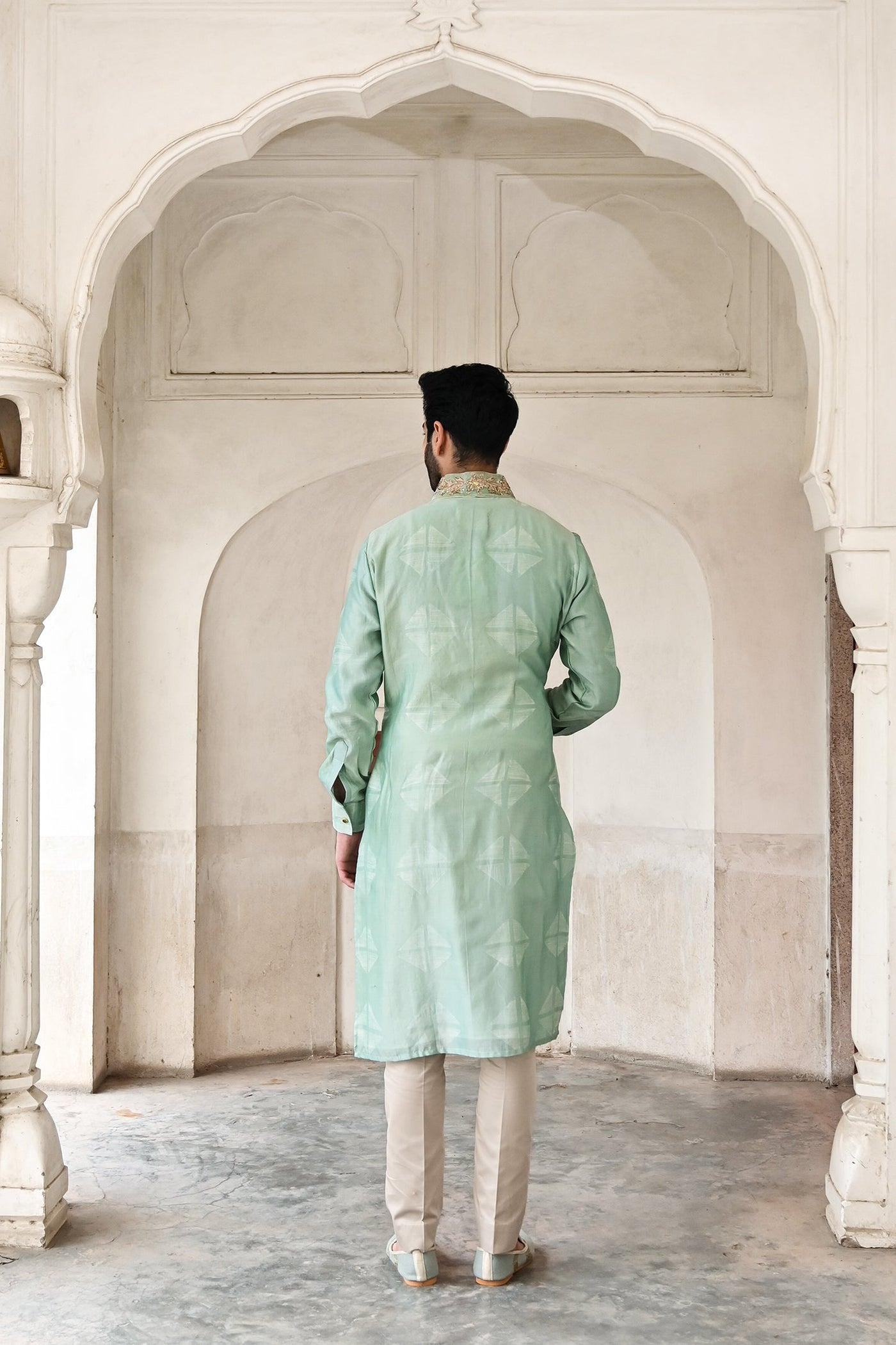 Groom's stunning aqua green kurta set with zardozi work online